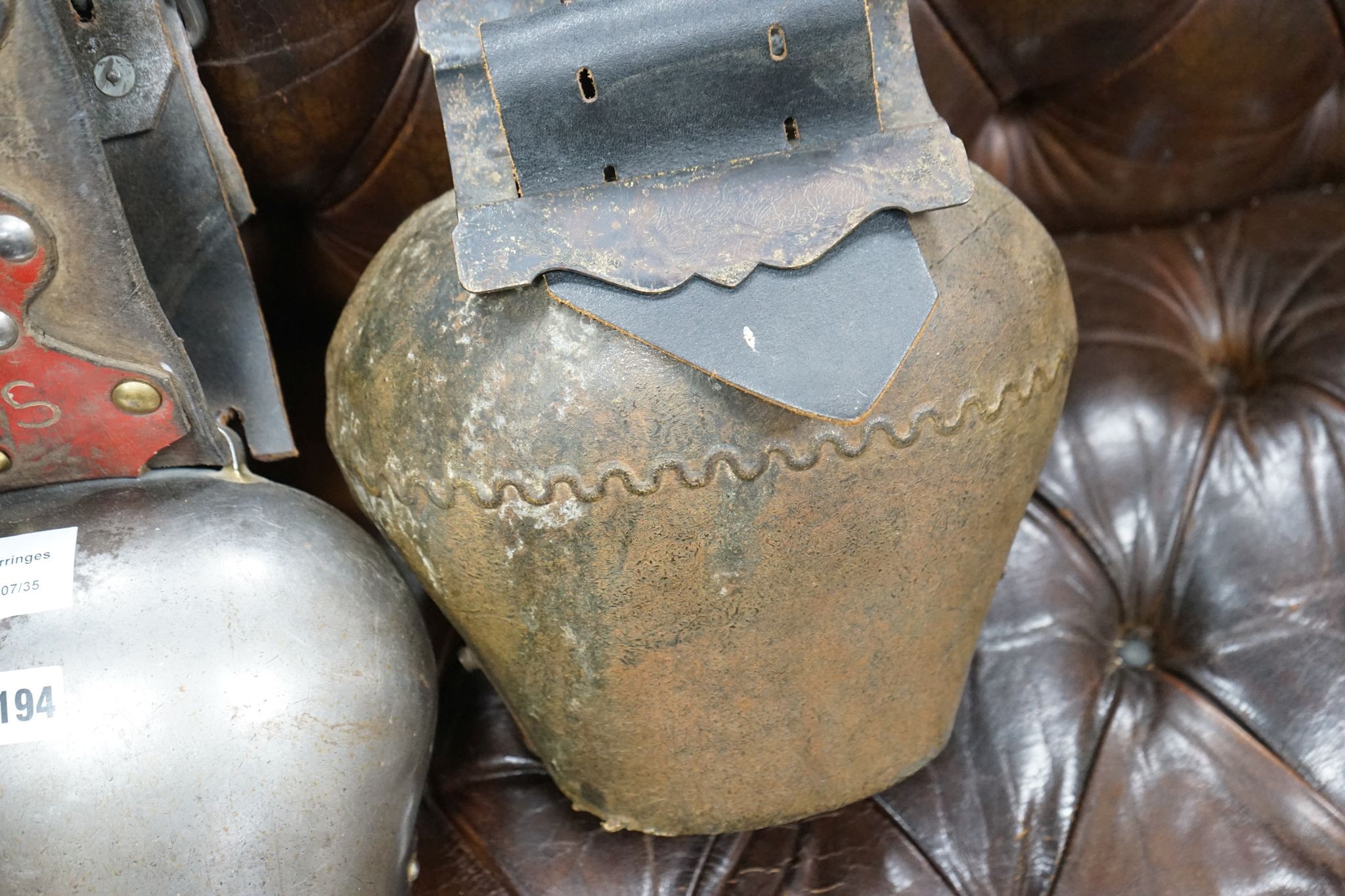 Two large French or Swiss vintage cow bells, larger 26cm, height 22cm